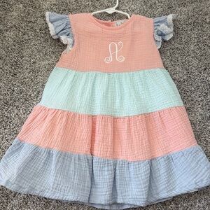 Casual monogrammed “A” dress